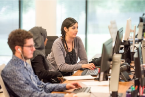 image of call centre staff on computers and phones